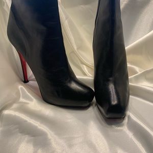 Authenticated Christian Louboutin Leather Booties. Fits more like a 10.5